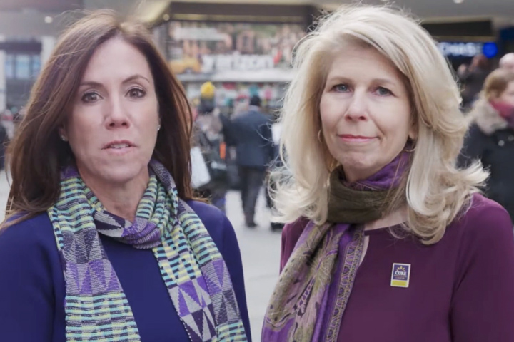 Cindy Gavin (Let's Win) and Kerri Kaplan (Lustgarten Foundation) wearing purple on a New York street for World Pancreatic Cancer Day