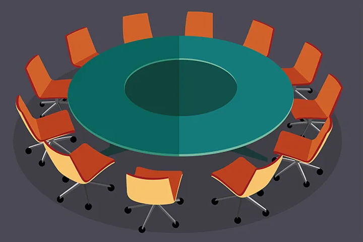 illustration of a green round table with orange chairs