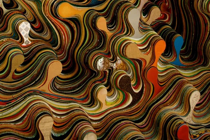 abstract image of layers of colored wavy shapes, with blobs sticking out in blue, orange, red, shades of tan, brown, and patterns.