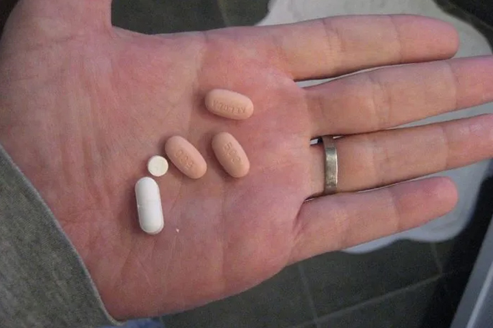 hand holding chemotherapy pills including Xeloda