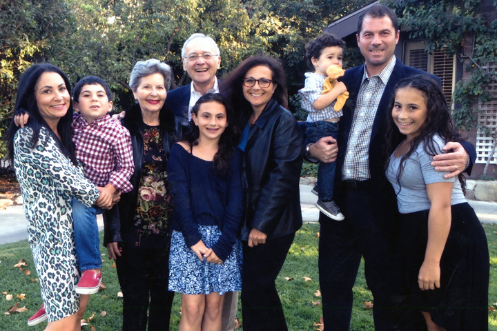 Pancreatic cancer survivor Nancy Nebenzahl and her husband, daughters plus one son-in-law, and four grandchildren, outside on a lawn