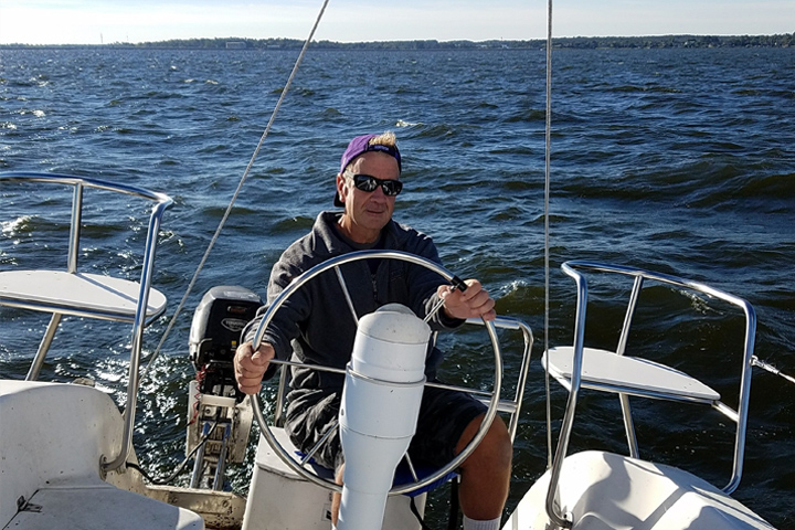 pancreatic cancer patient Scott Hirshey on his sailboat