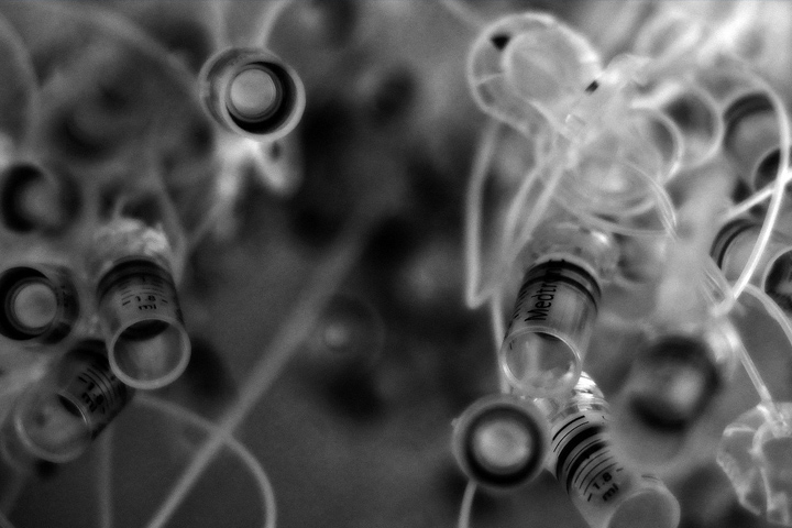 Abstract black and white image of laboratory equipment and tubes