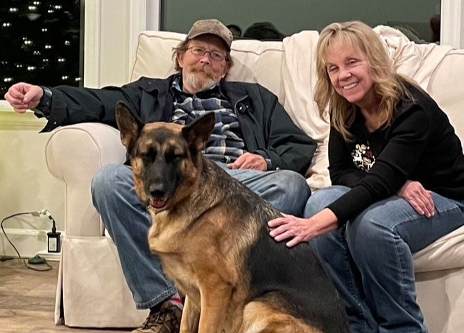 Pancreatic cancer survivor Mike Emerson, his wife Carol and their dog