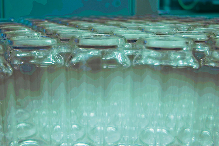 altered photo of bottles in teal and aqua