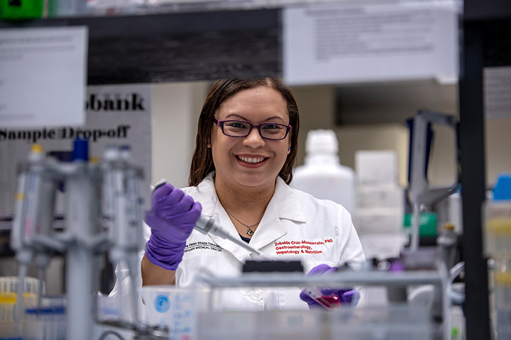 Researcher Zobeida Cruz-Monserrate in a lab